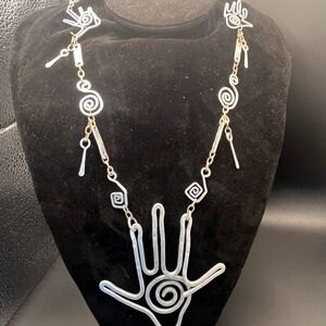 Silver Spiral Hand Necklace